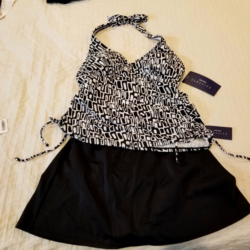 Two tankini tops and swim skirt. New with tags.